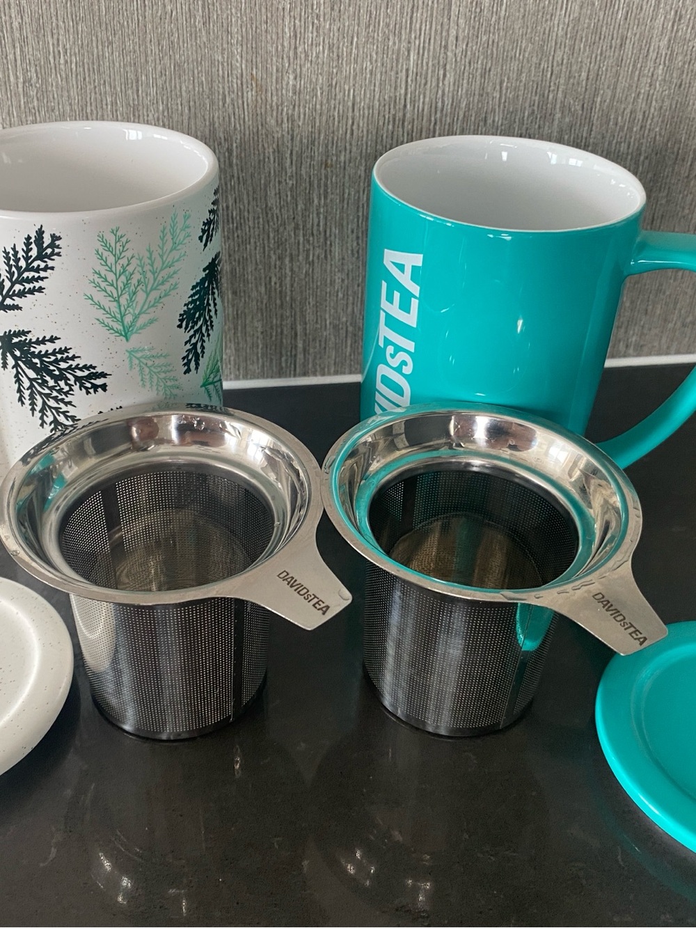 A set of DAVIDsTEA Stainless Steel Tea Infusers - Incl. Mugs, Lids, And Infusers